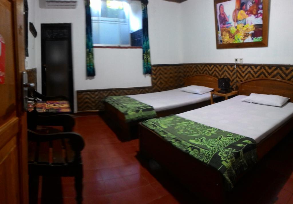 Mini Tiga Homestay Pangandaran Esterno foto